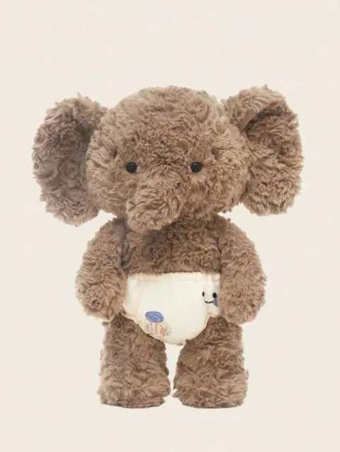 Toto — Shy Baby Elephant