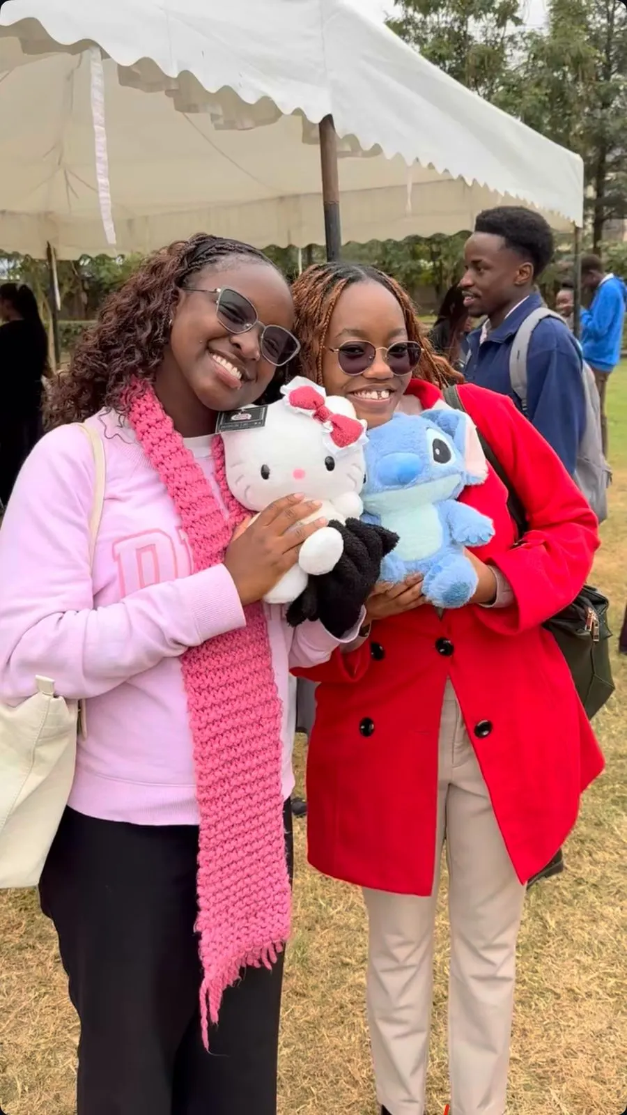 A group of friends hugging their plushies